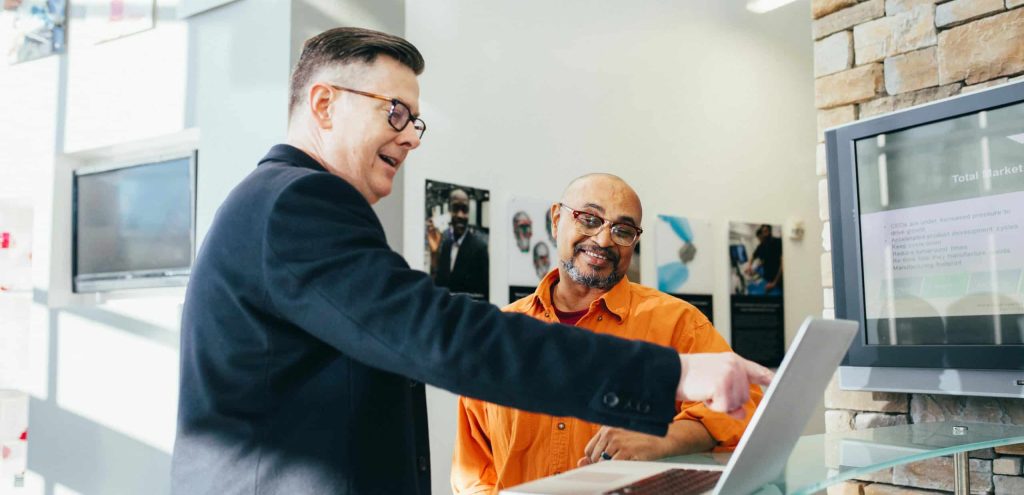 Man Pointing Laptop Computer